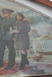 Grodno - malowidło na budynku straży pożarnej z grodzieńską Moną Lizą