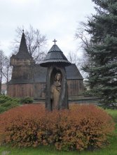 Matka Boska w dziupli pnia dębu.